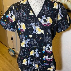 Used Disney women’s scrub top. Size small. Great condition.